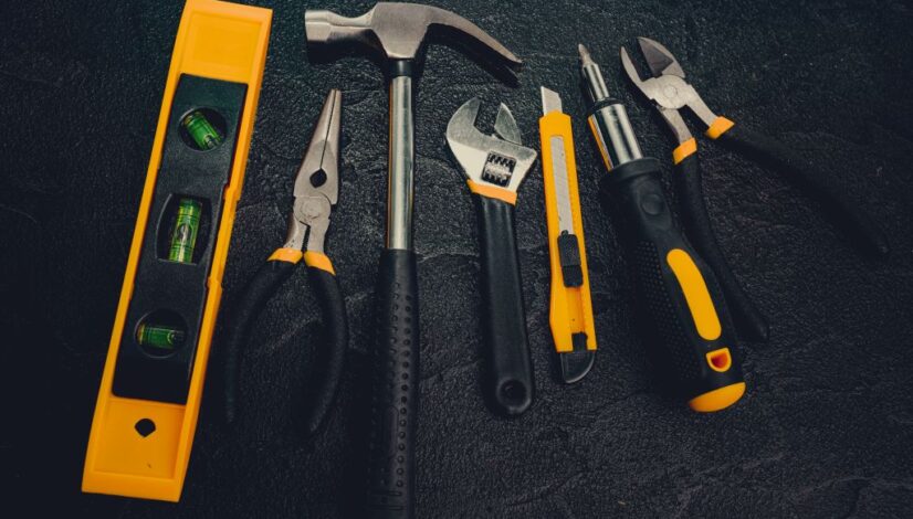 basic-home-repair-tools-on-black-background-2023-11-27-04-59-36-utc
